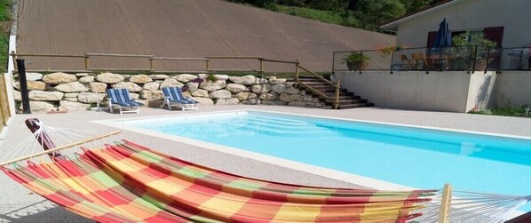 Seasonal outdoor pool, pool umbrellas, sun loungers