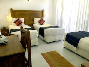Deluxe Triple Room with Balcony
