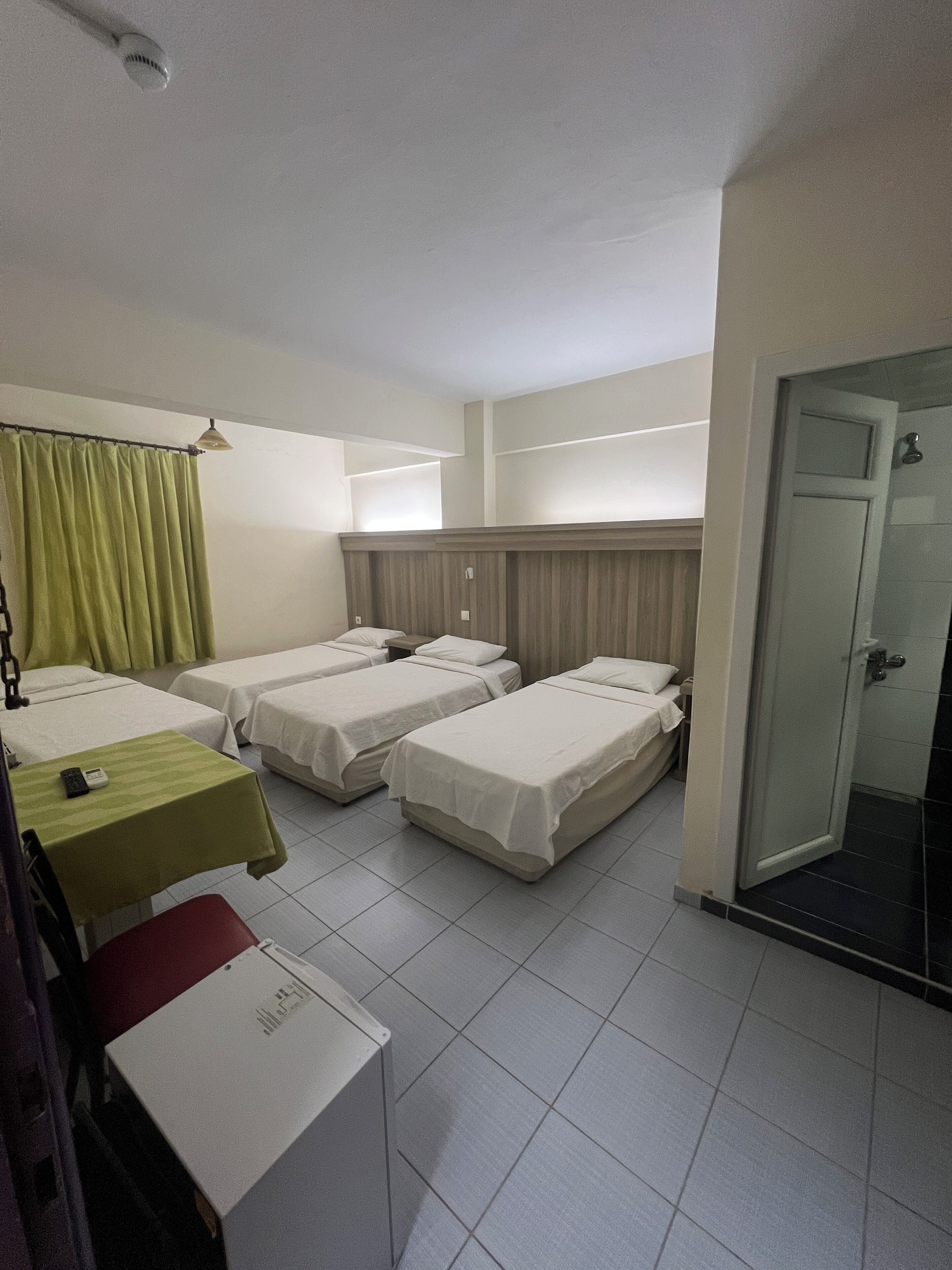 quadruple room, 4 twin beds | 1 bedroom, minibar, desk, laptop workspace