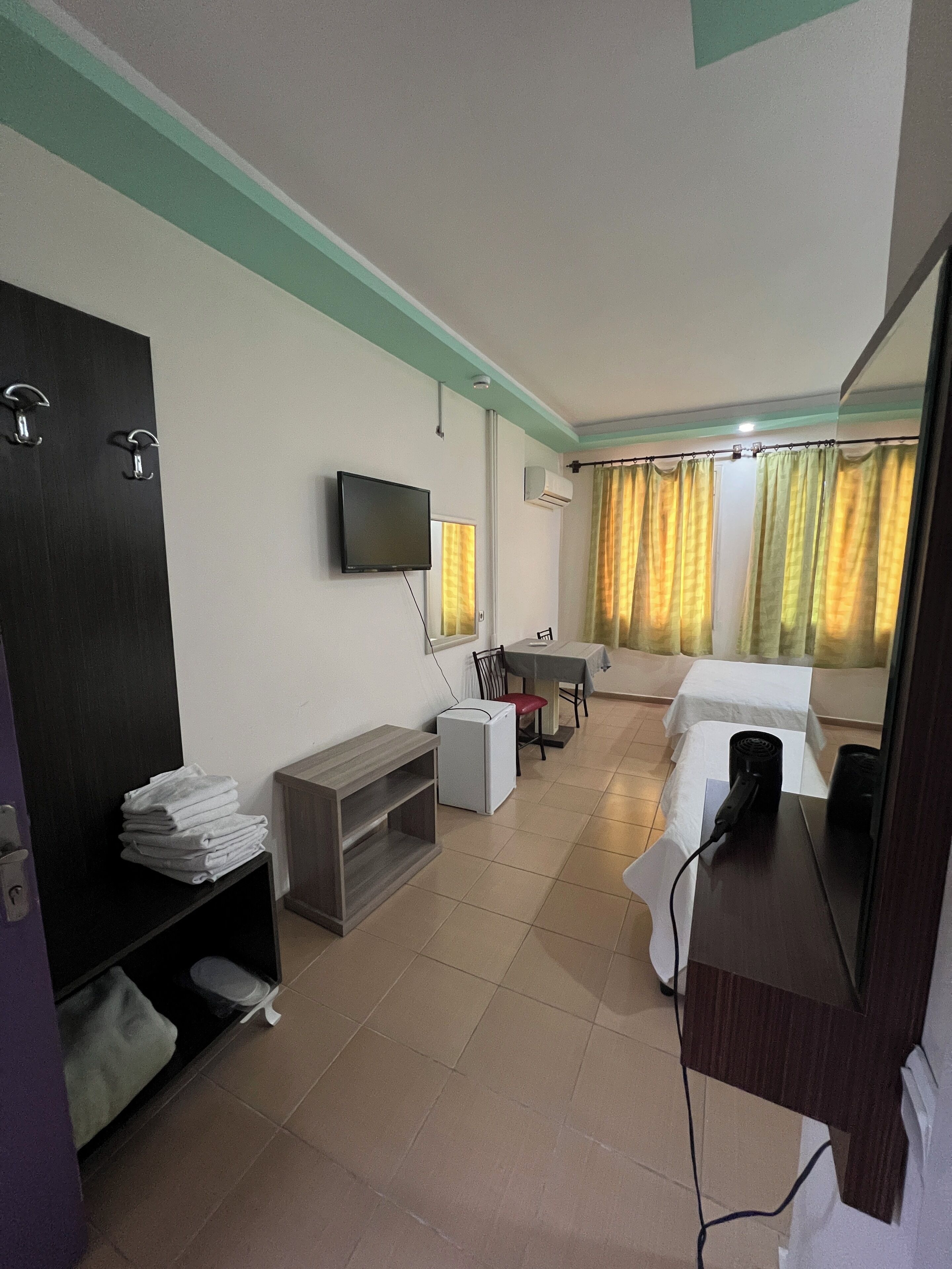 basic quadruple room | 1 bedroom, minibar, desk, laptop workspace