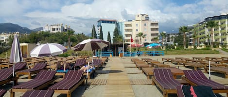 Private beach nearby, sun loungers, beach umbrellas, beach bar