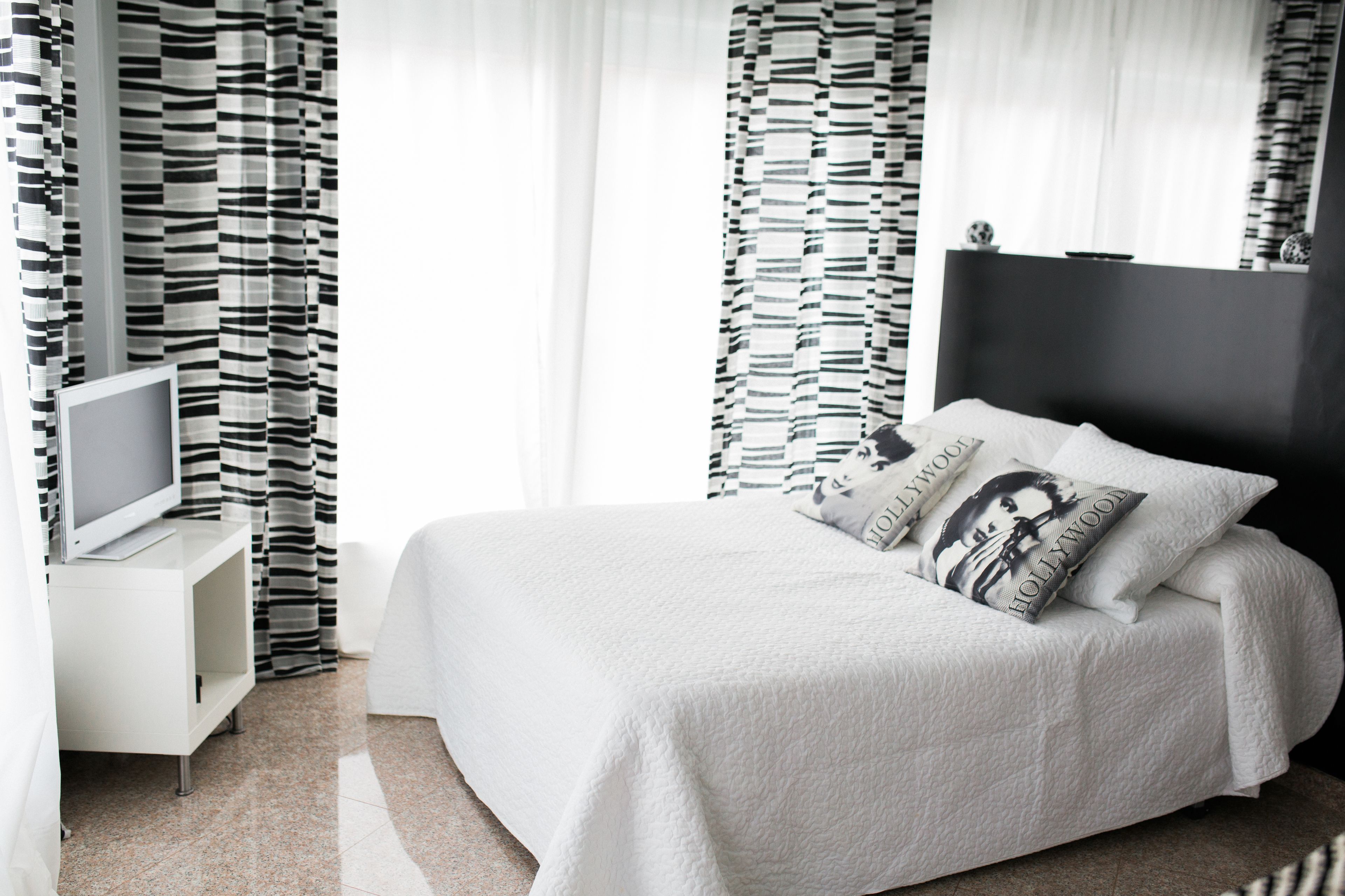 Premium bedding, down comforters, desk, laptop workspace