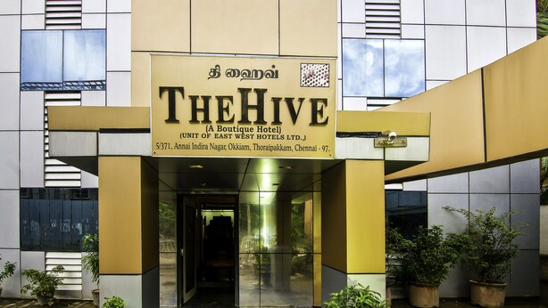 The entrance of The Hive Boutique Hotel with a sign indicating its location in Chennai. - Treebo Trip Hive (Chennai)