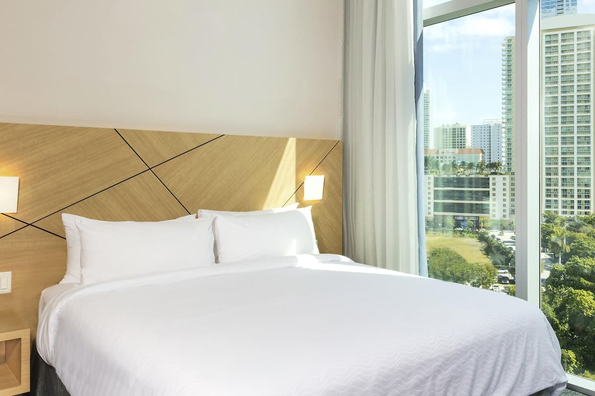 Suite, 1 King Bed, Bay View | Premium bedding, minibar, in-room safe, desk