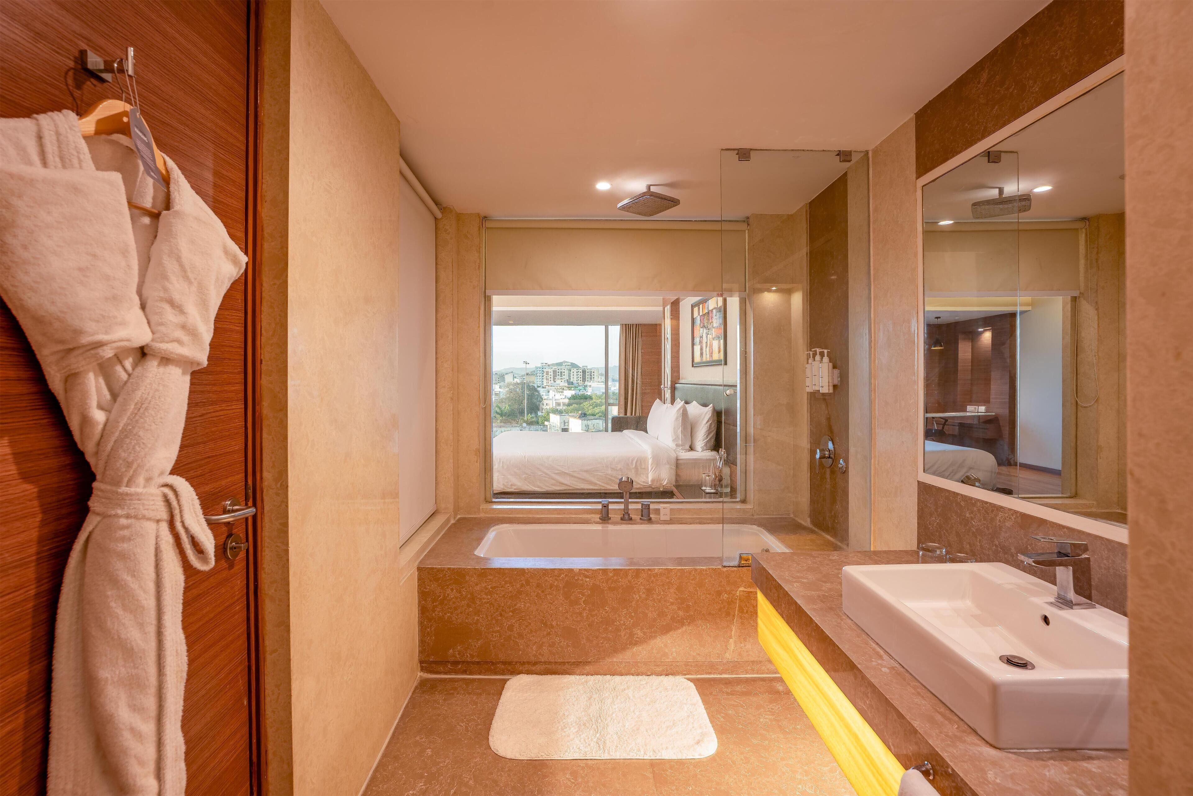 Suite, 1 Bedroom | Bathroom | Shower, designer toiletries, hair dryer, bathrobes