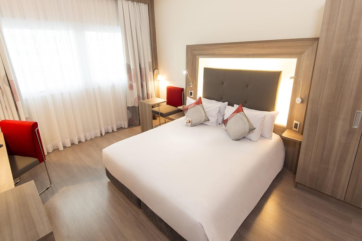 Standard Apartment, 1 Double Bed | Minibar, in-room safe, desk, blackout drapes