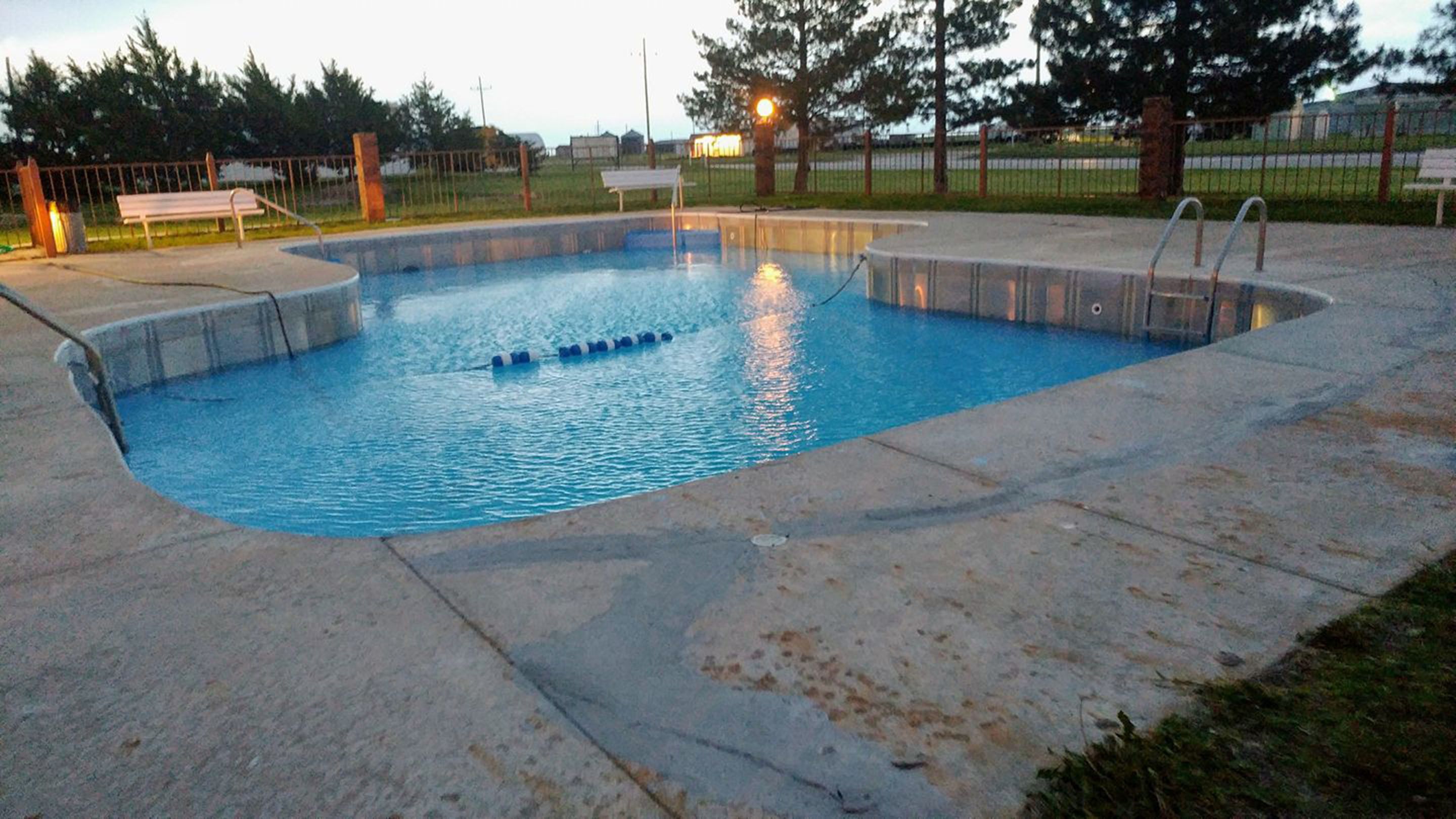 seasonal outdoor pool, open 6 am to 10:30 pm, pool loungers