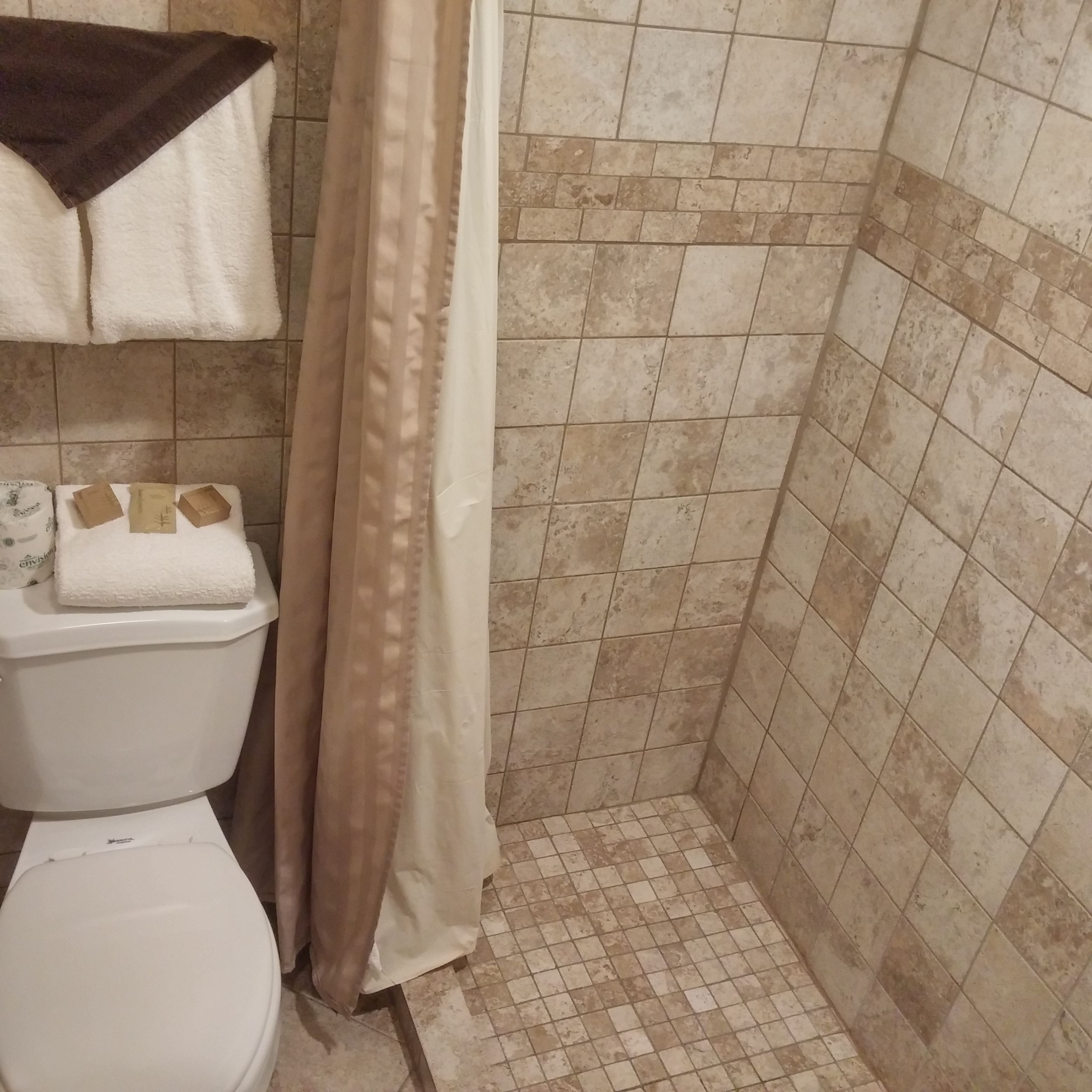 deluxe single room, 1 king bed, non smoking | bathroom | bathtub, designer toiletries, towels, soap