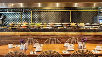 Breakfast, lunch, dinner served; international cuisine