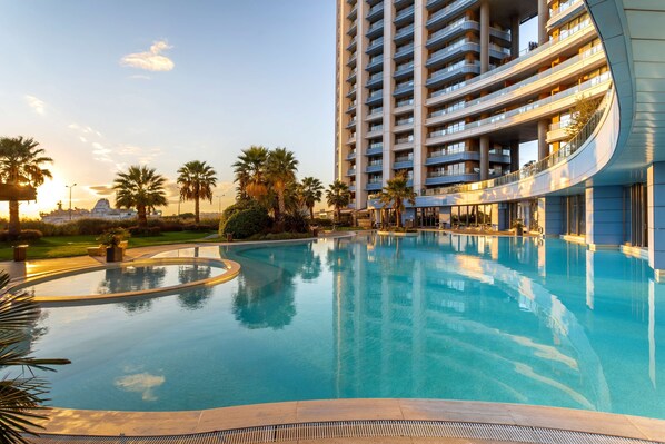 Indoor pool, seasonal outdoor pool, free pool cabanas, pool umbrellas