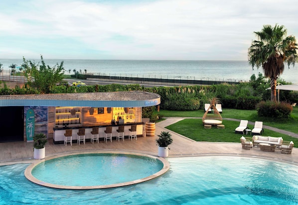 Indoor pool, seasonal outdoor pool, free pool cabanas, pool umbrellas