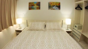 Frigobar, roupa de cama