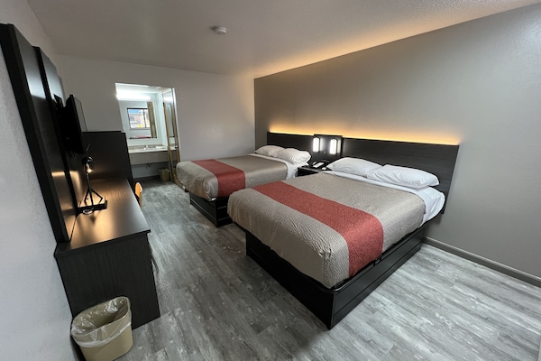 Blackout drapes, WiFi (free), bed sheets