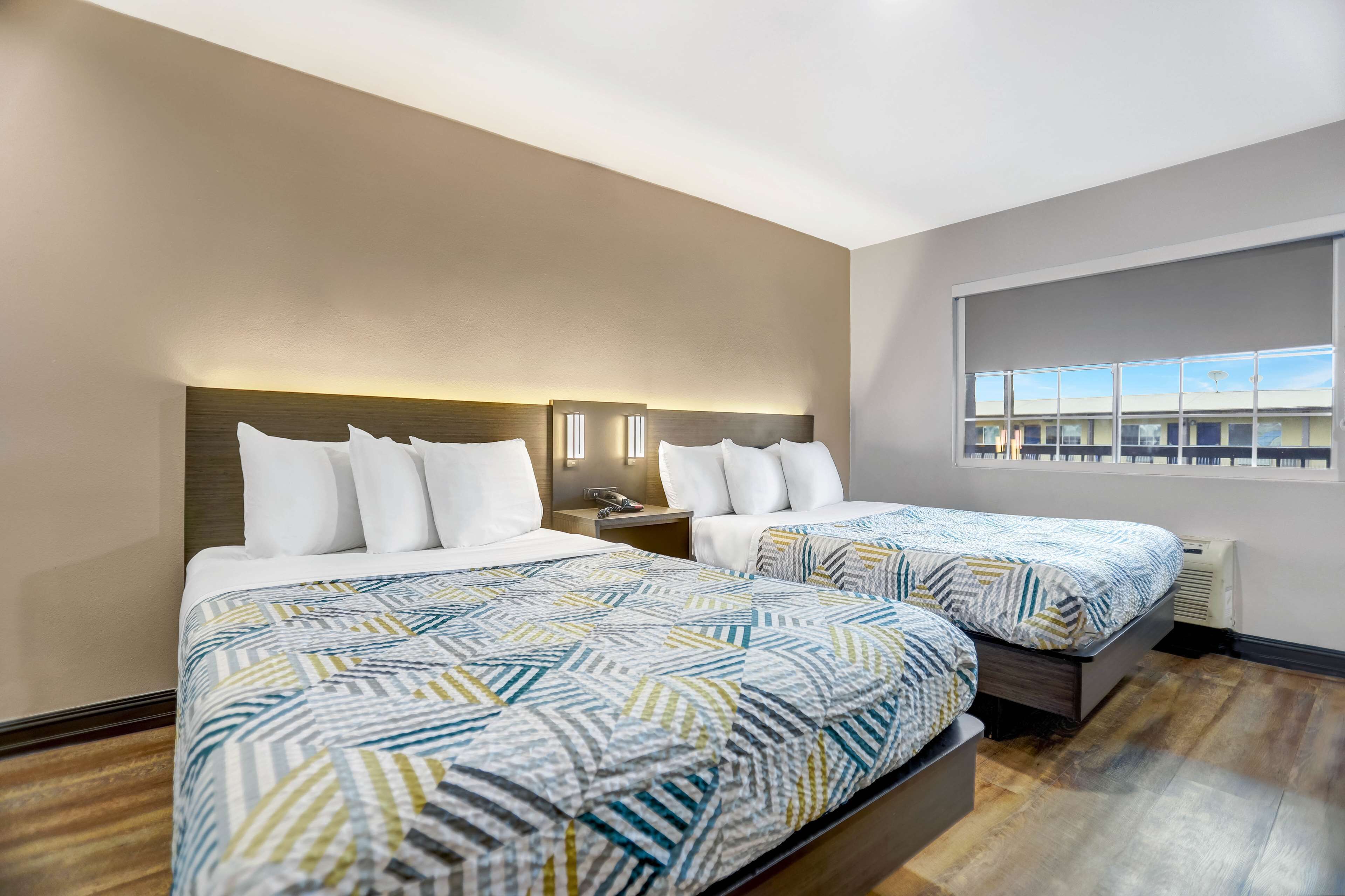 Desk, blackout curtains, free WiFi, bed sheets