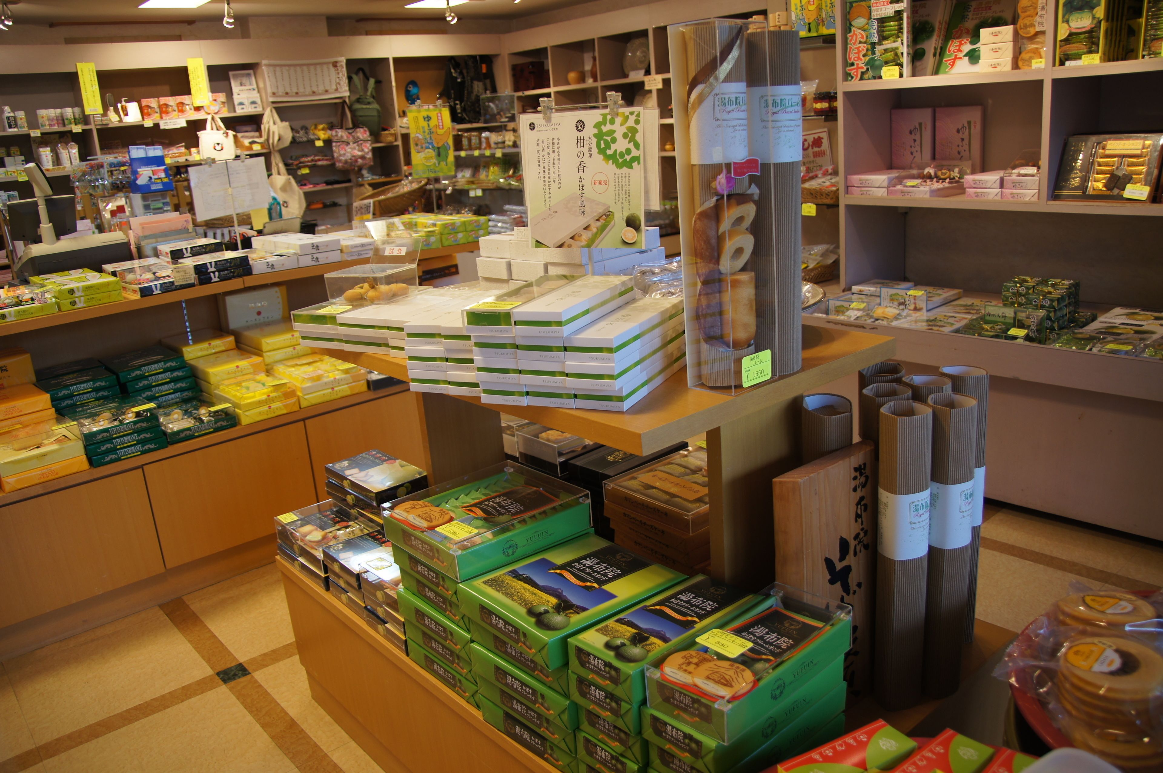 A bookstore with shelves stocked with books and magazines.