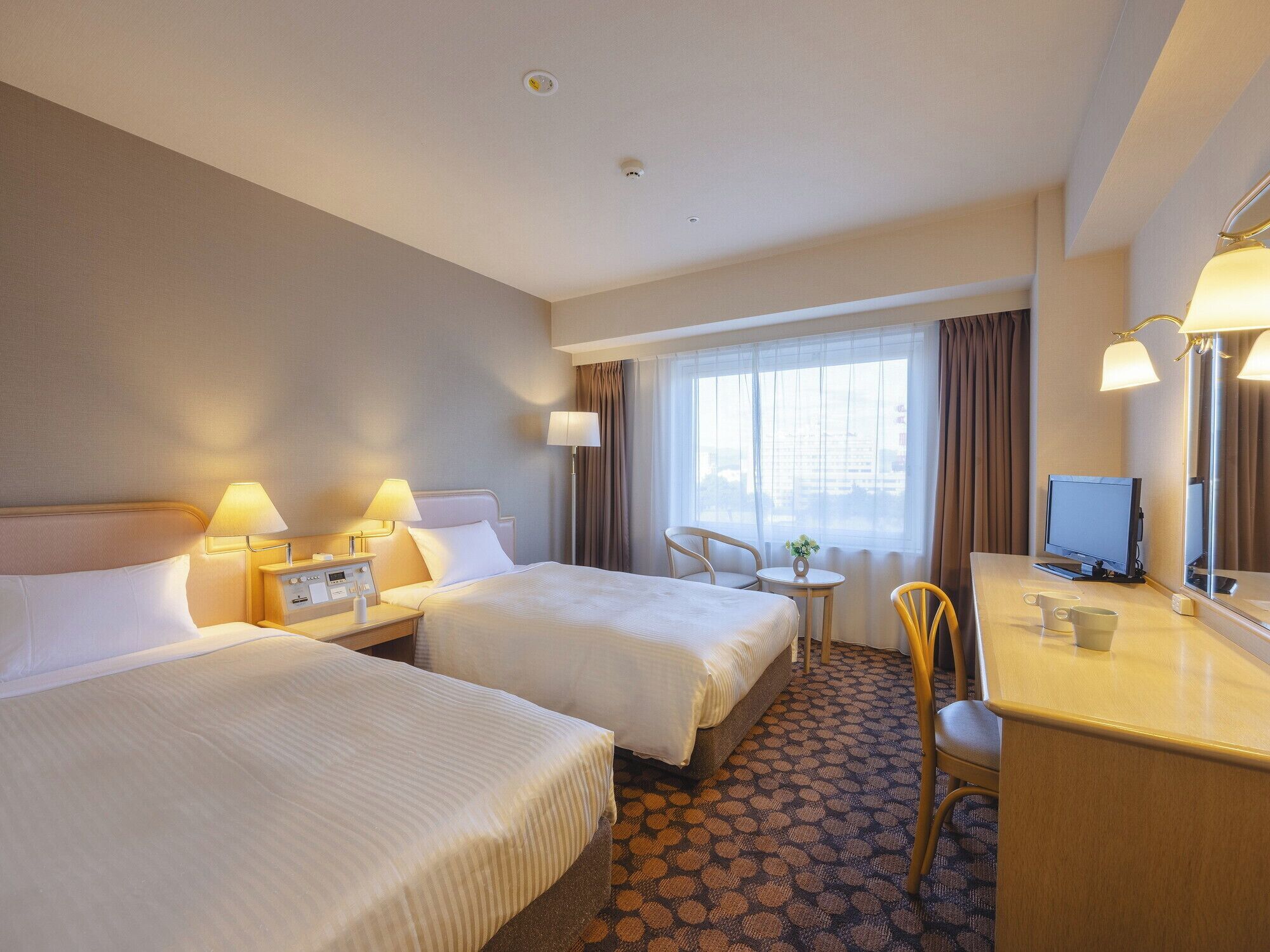 Premium bedding, down comforters, desk, laptop workspace