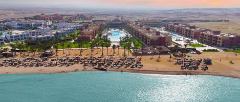 Private beach, white sand, sun-loungers, beach umbrellas