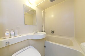 Ensemble douche/baignoire, articles de toilette gratuits, sèche-cheveux