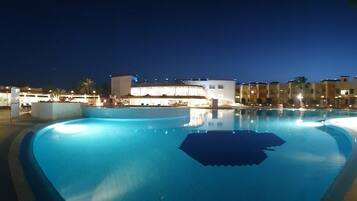 2 outdoor pools, pool umbrellas, pool loungers