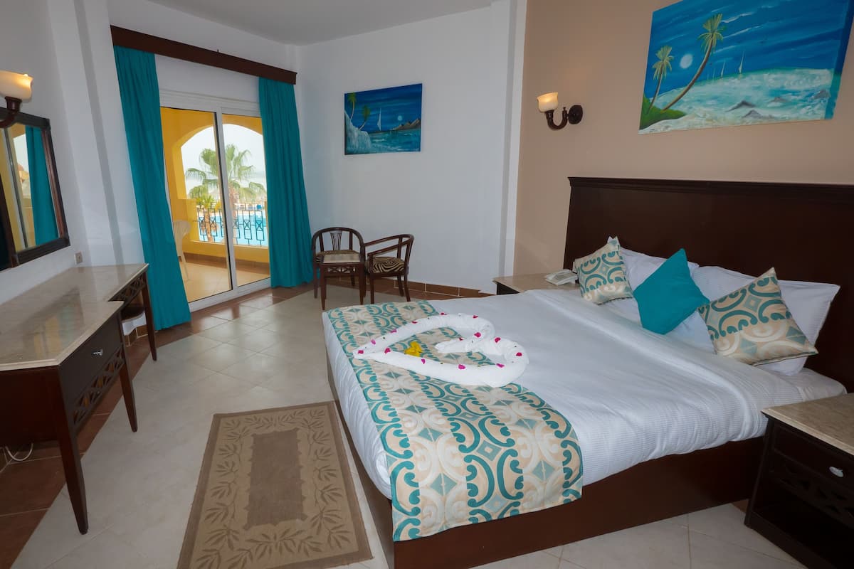 Double Room, 1 Double or 2 Single Beds | In-room safe, desk, blackout curtains, free cots/infant beds