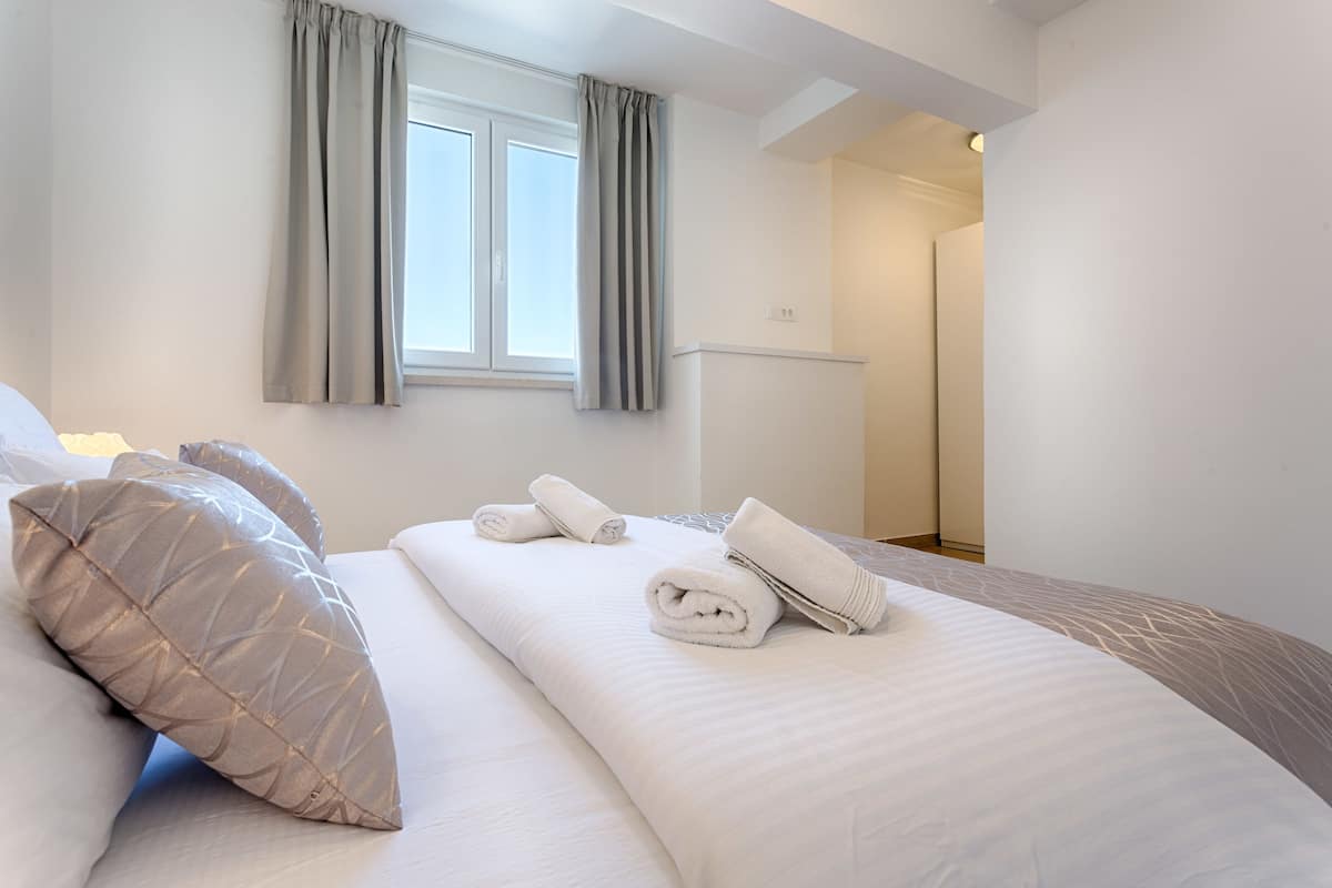 Apartment, Balcony, Sea View | Hypo-allergenic bedding, in-room safe, soundproofing, free WiFi