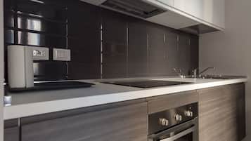 Luxury Apartment | Private kitchen | Full-size fridge, electric kettle