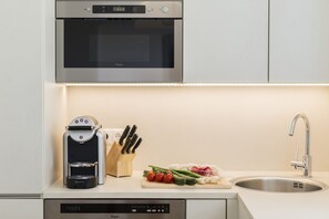 Standard 1 Bedroom Apartment | Private kitchen | Full-size fridge, microwave, oven, stovetop