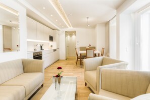 Superior 2 Bedroom Apartment | Living area | 0-inch TV with cable channels