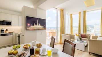 Standard 1 Bedroom Apartment | Private kitchen | Full-sized fridge, microwave, oven, stovetop