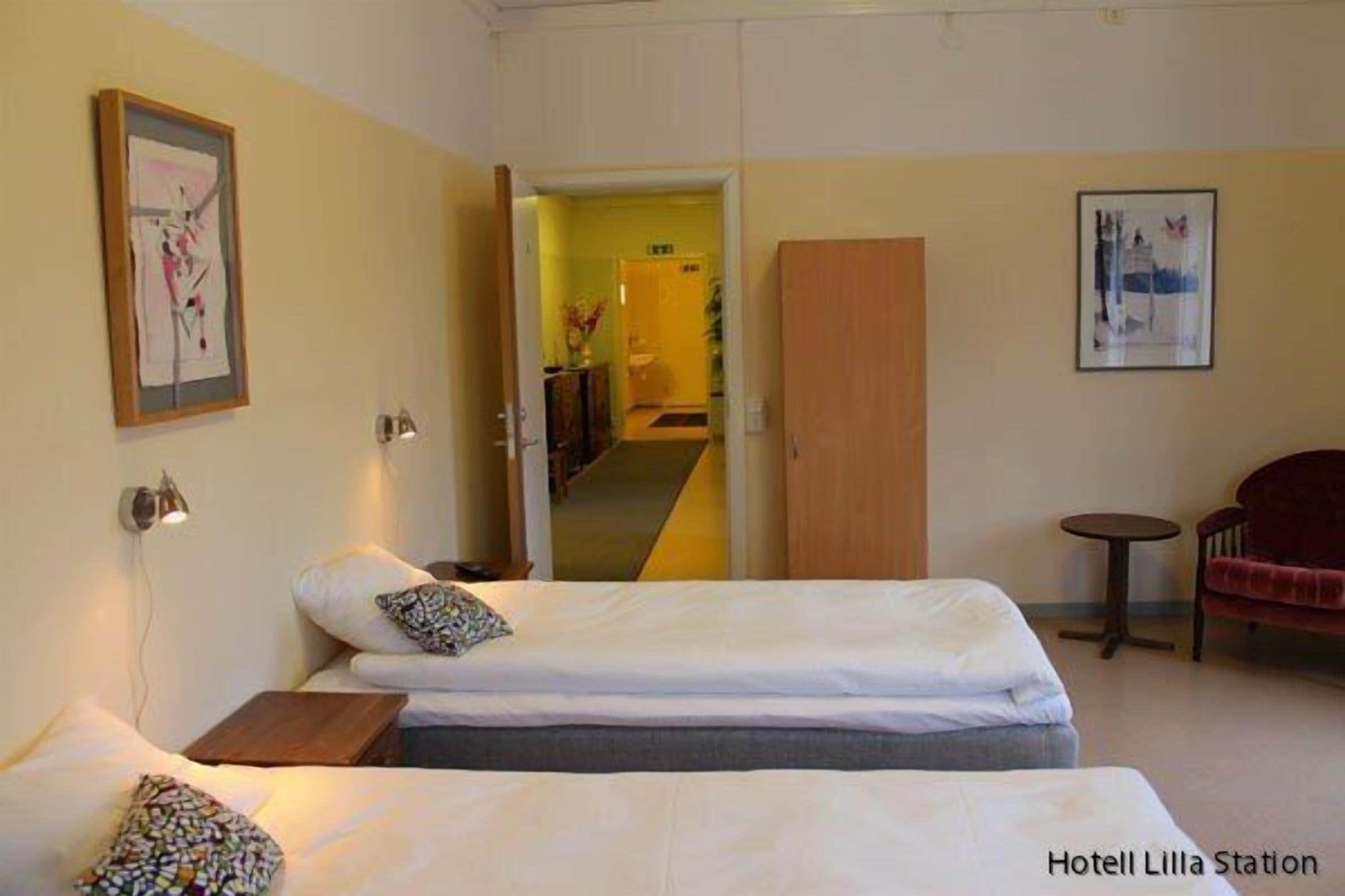 Family Room | Premium bedding, individually decorated, desk, iron/ironing board