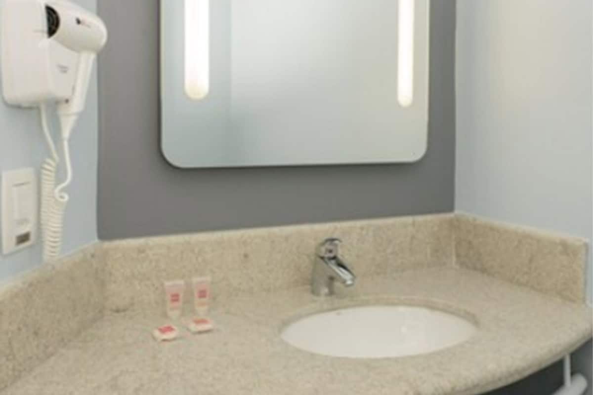 shower, eco-friendly toiletries, hair dryer, towels