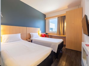 Standard Room, 2 Twin Beds | Minibar, in-room safe, desk, blackout drapes