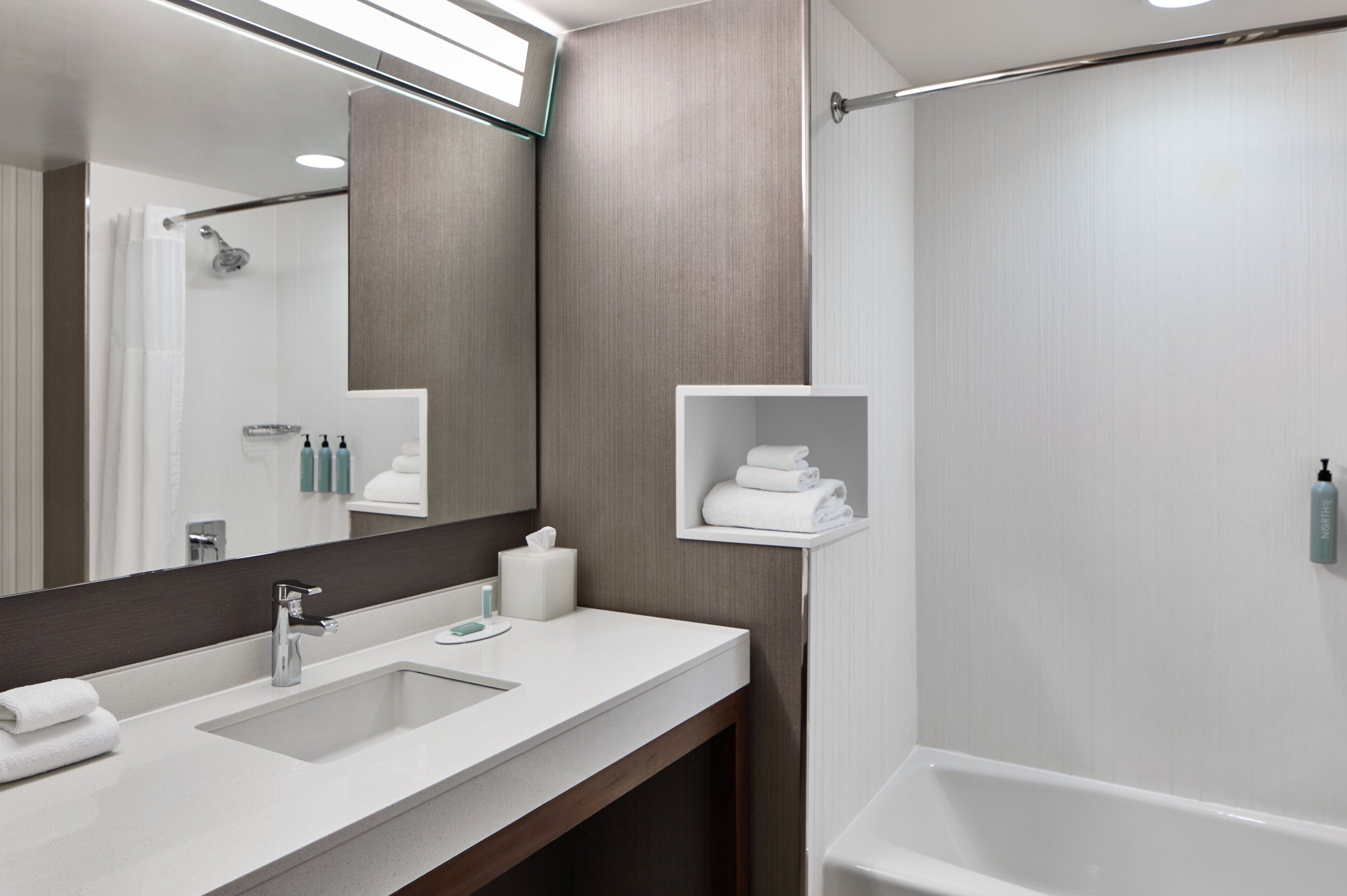 combined shower/bathtub, free toiletries, hair dryer, towels