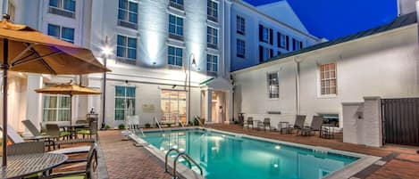 Seasonal outdoor pool, open 8 AM to 8 PM, pool umbrellas, pool loungers