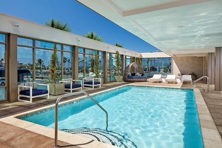 Outdoor pool, open 7:00 AM to 10:00 PM, pool loungers. Homewood Suites by Hilton San Diego Downtown/Bayside