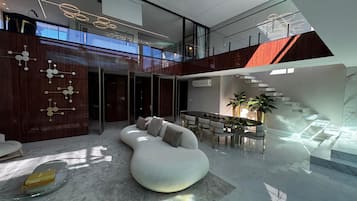 Cobertura superluxo, piscina particular | Área de estar