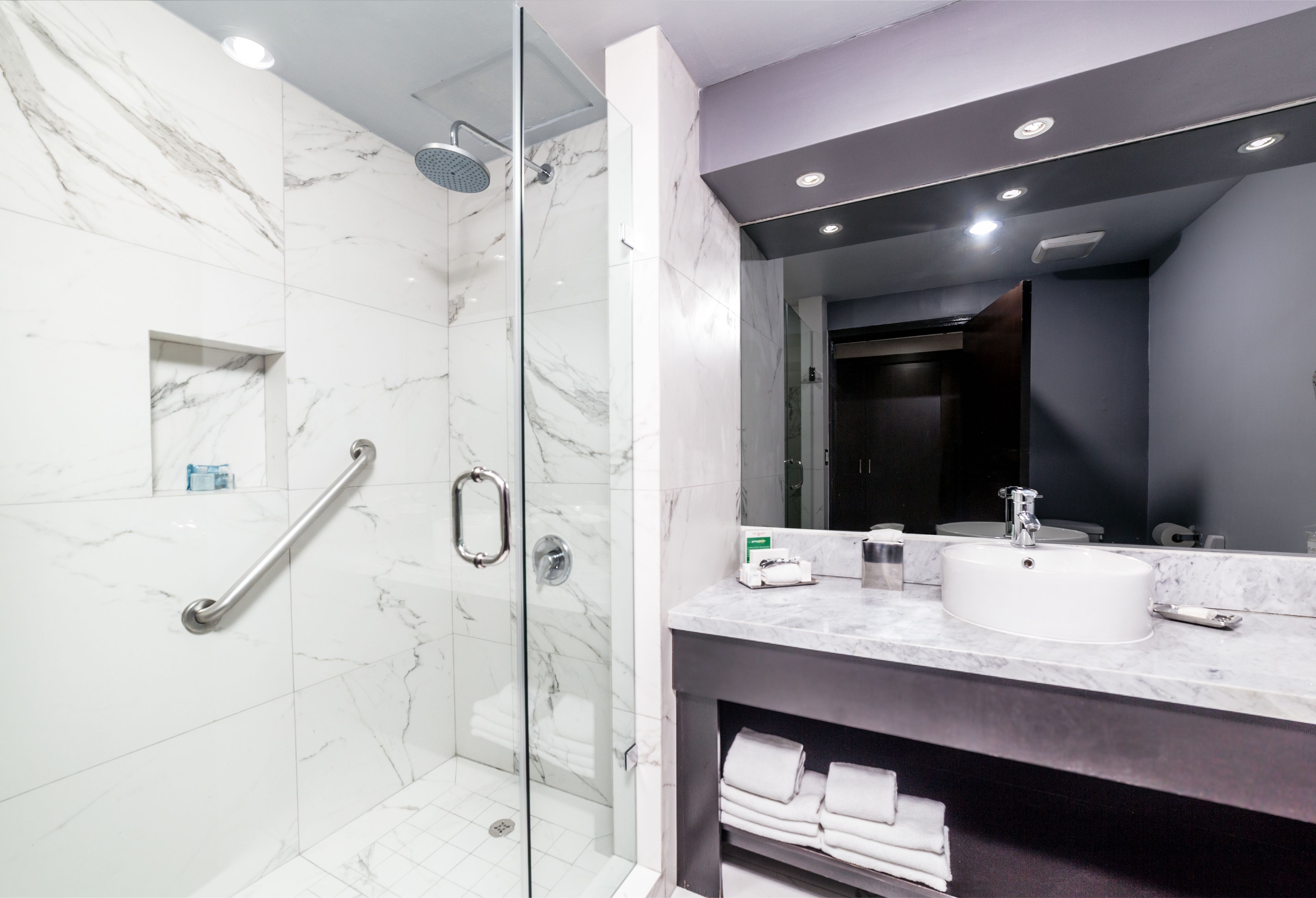 shower, free toiletries, hair dryer, towels