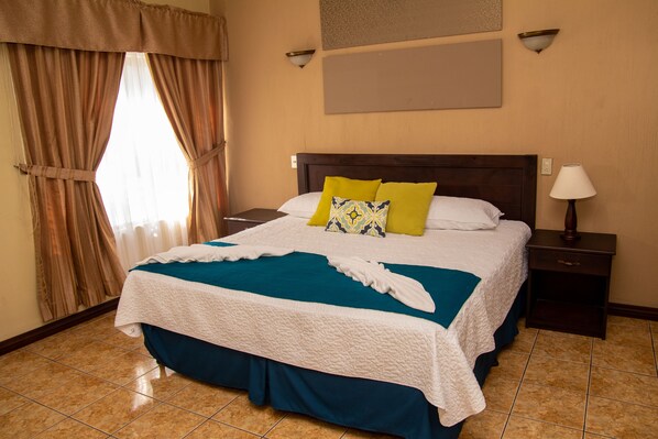 Habitación estándar, 4 habitaciones | Caja de seguridad en la habitación, wifi gratis y ropa de cama 