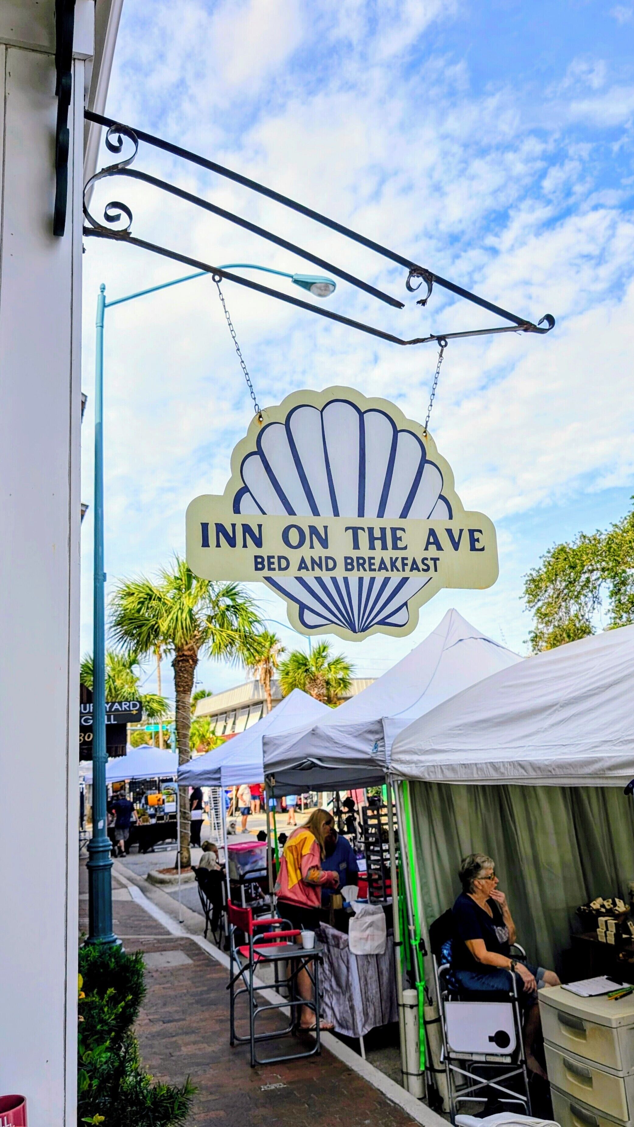 A sign for 'Inn on the Ave' offering bed and breakfast services.
