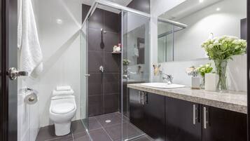 Premium Apartment, 1 Bedroom, City View | Bathroom | Shower, free toiletries, hair dryer, towels
