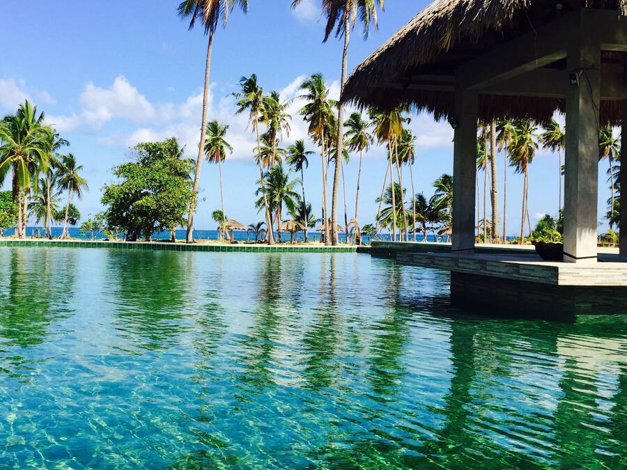 Outdoor pool, open 8:00 AM to 8:00 PM, pool loungers