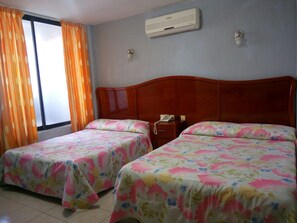 Standard Double Room, 2 Queen Beds, Balcony, City View | Premium bedding, desk, free WiFi, bed sheets