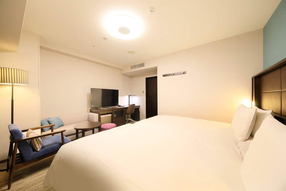 Desk, laptop workspace, blackout curtains, free WiFi