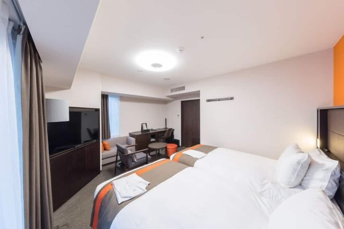Desk, laptop workspace, blackout curtains, free WiFi
