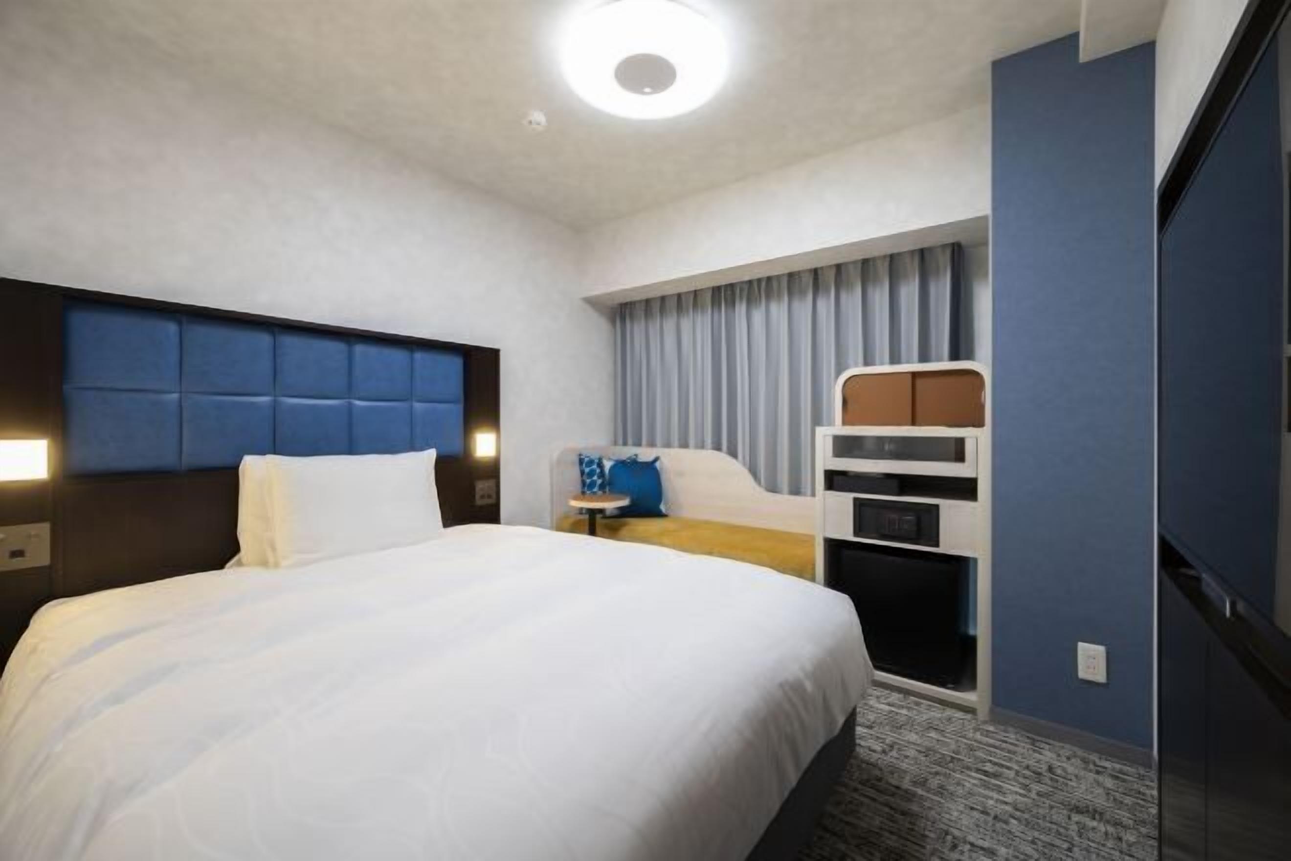 Desk, laptop workspace, blackout curtains, free WiFi