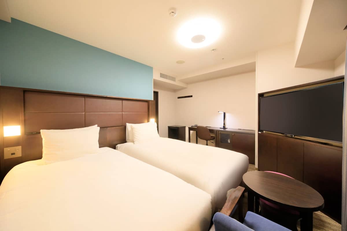 Desk, laptop workspace, blackout curtains, free WiFi