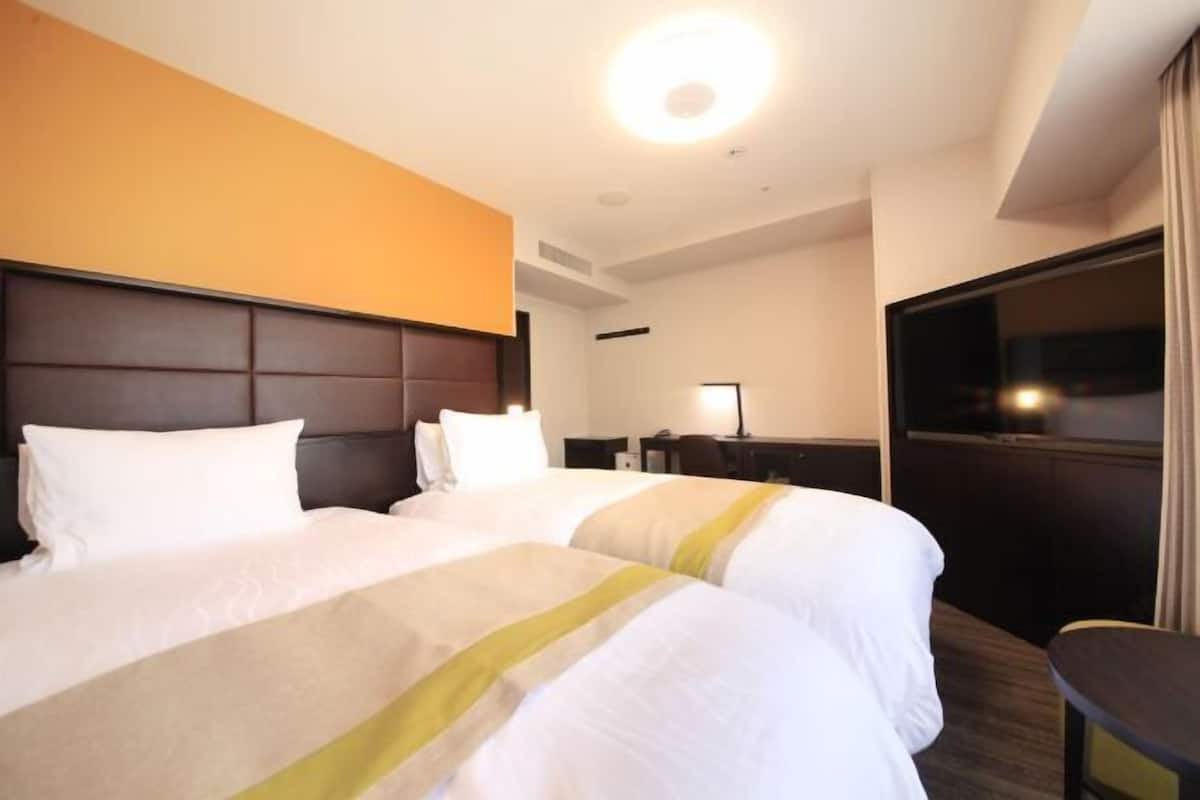 Desk, laptop workspace, blackout curtains, free WiFi