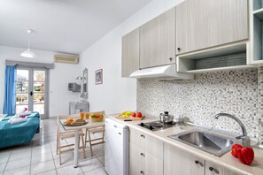 Studio | Private kitchenette | Coffee/tea maker, fridge, stovetop, cookware/dishes/utensils - Ifigenia Apartments (Hersonissos)