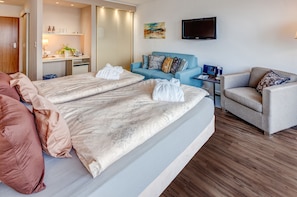 Minibar, coffres-forts dans les chambres, rideaux occultants