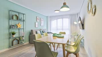 Duplex, 3 Bedrooms | Living area | 30-inch TV with digital channels